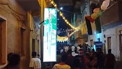 صور الشهيد أحمد الملقب تزين مائدة إفطار شباب نجع سعيد بقنا (فيديو)