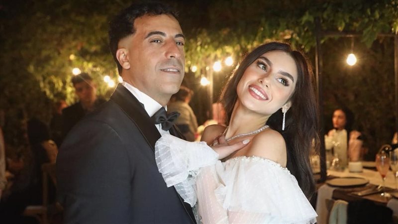 أيمن الرفاعي وزوجته،
