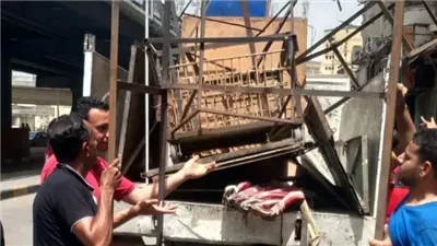 حملة مكبرة لإزالة التعديات على الطريق العام بحي جنوب الجيزة (صور)