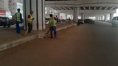 حملات مكبرة لرفع كفاءة النظافة بالطريق الدائري بالجيزة (صور)