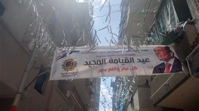 محيط الكنائس وشوارع الغربية تتزين بلافتات تهنئة من الرئيس للأقباط