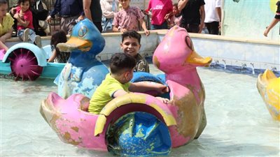 إقبال المواطنين على الملاهي بالحديقة الدولية احتفالا بشم النسيم (صور) 