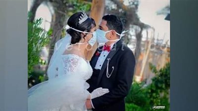 بالكلور والكمامات.. أنطونيوس ونانسي أول فرح في المنيا يحارب كورونا | صور