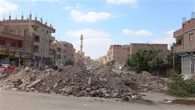 رفع الإشغالات بشارع الإسطبل ورفع طبقة الرصف القديم في حملة مكبرة |صور 