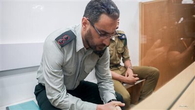 صوّر مجندات عاريات سرا، إدانة 