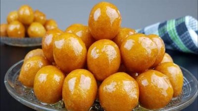 بالشيكولاتة السوداء والبيضاء.. طريقة عمل الزلابية المقرمشة