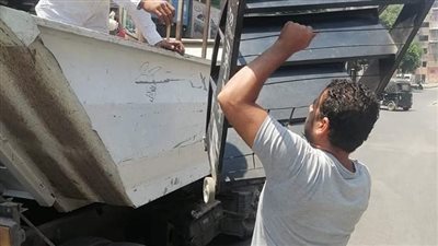 سحب معدات تركيب إعلان بدون تصريح بالجيزة (صور)