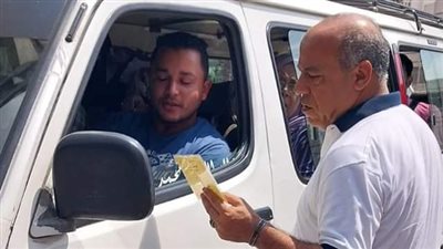 ضبط 10 سيارات سرفيس مخالفة بنزلة كوبري فيصل بالجيزة 