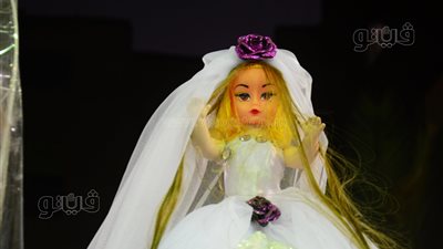 عروسة المولد النبوي وجهاز العروسة «الفرحة فرحتين».. يصل سعرها لـ 450 جنيها.. تمزج بين الاحتفال بميلاد سيد الخلق والزفاف وبدء حياة جديدة (فيديو وصور) 