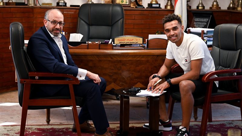 أوباما مع حسام المندوة,