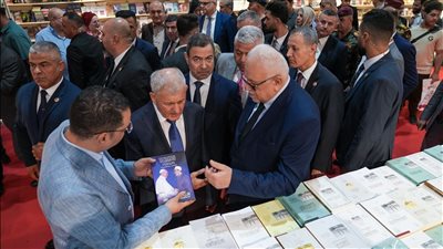 الرئيس العراقي يزور جناح مجلس حكماء المسلمين في معرض بغداد الدولي للكتاب (صور)