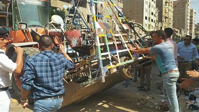 محافظة الجيزة ترفع تعديات الباعة الجائلين بشارع مستشفى الصدر بالعمرانية (صور)