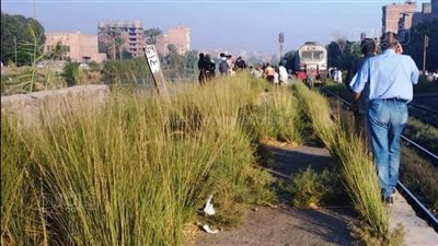 النيابة العامة تعاين موقع حادث تصادم قطاري المنيا (صور)