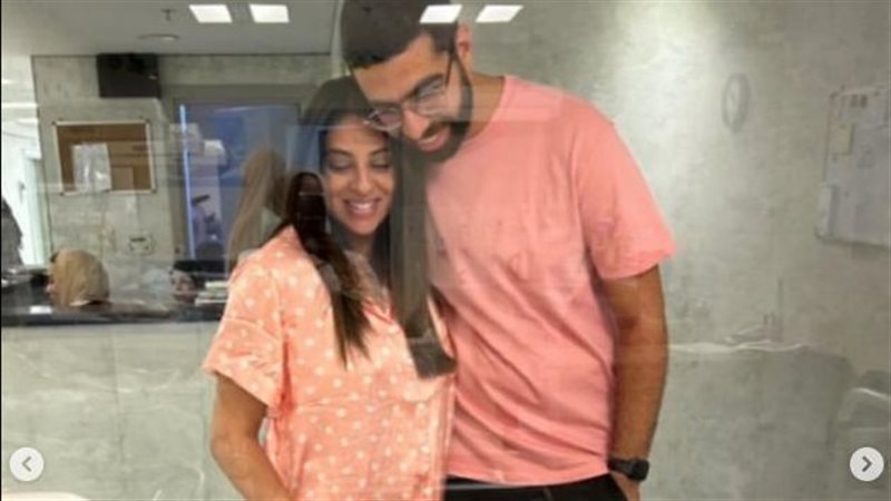 ندى حافظ وزوجها 