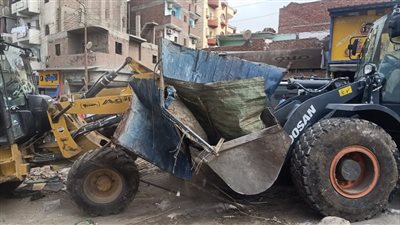 حملة مكبرة لرفع الإشغالات بشارعي سوق الجمعة وعبد الحكيم عامر في الإسماعيلية (صور) 