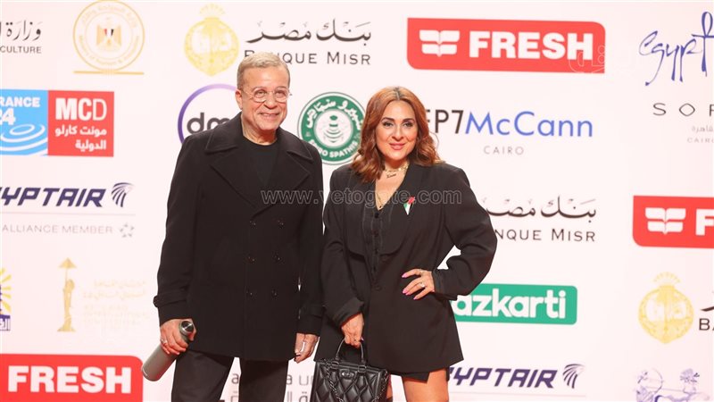 شريف منير وزوجته،