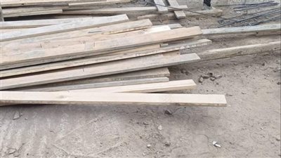 حي الوراق يُنفذ حملة لإزالة الشدات الخشبية بشارع مدرسة الأورمان (صور)