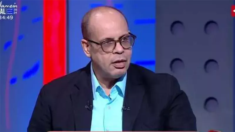 الكاتب الصحفي أكرم