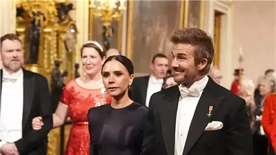 ديفيد بيكهام وزوجته يشاركان في مأدبة عشاء بالقصر الملكي البريطاني 