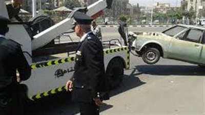 رفع 65 سيارة ودراجة نارية متروكة في القاهرة والجيزة