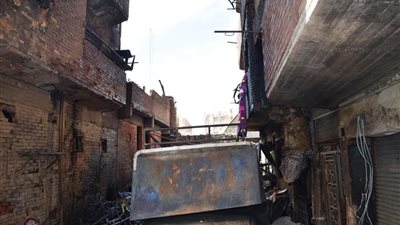 مساعدات مادية عاجلة وأماكن إيواء للمتضررين في حريق عمارتين سكنيتين بأسوان