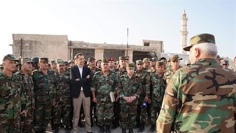 بشار الأسد ورجاله،