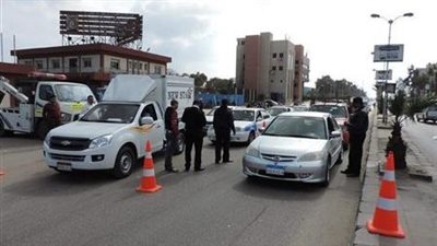 ضبط 34 دراجة نارية مخالفة وسيارات متروكة بالشارع في حملة مكبرة بالجيزة والقاهرة 