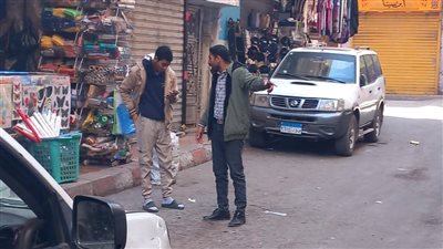 استمرار أعمال رفع الإشغالات من شوارع قنا (صور)