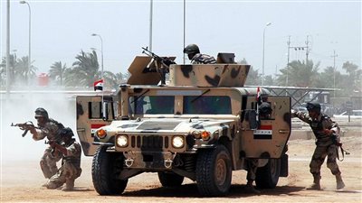 مصرع رجلي أمن وإصابة آخرين في العراق على يد مجرم يحرق السيارات بالطريق