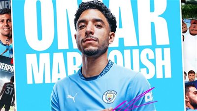 مرموش يرتدي القميص رقم 7 مع مانشستر سيتي 