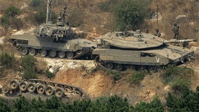 حكاية عجوز لبنانية تحدت دبابات وجنود الاحتلال بالحجارة للحفاظ على أرضها