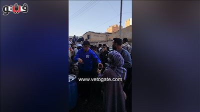 أهالي قنا يحتفلون بليلة النصف من شعبان بتوزيع التمر والأرز بلبن على المارة (فيديو)