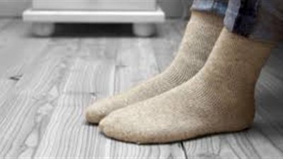  حكم المسح على الجوربين في المنزل بدون عذر وصفته ومدته ومبطلاته 