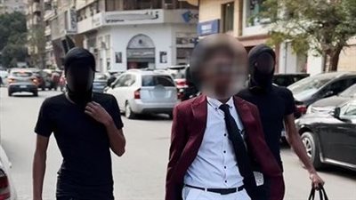 عقب تداول فيديو، القبض على المتهمين بارتداء أقنعة للوجه والسير بأحد شوارع الجيزة 