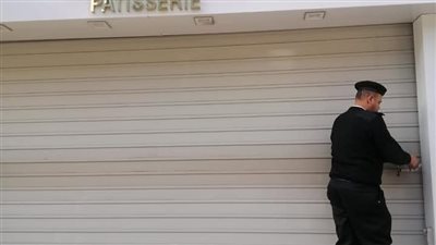 إغلاق وتشميع 15 محلا تجاريا بالوراق لمخالفة شروط الترخيص|صور