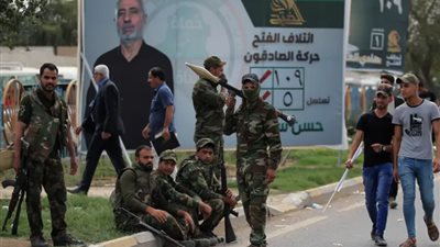 لتجنب غضب أمريكا، فصائل عراقية تعلن استعدادها لتسليم السلاح