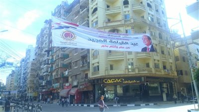 لافتات التهنئة بعيد القيامة تزين شوارع الغربية 