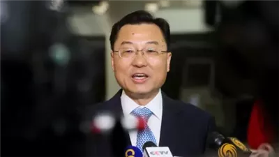 سفير الصين لدى واشنطن: الرسوم الجمركية ستدمر الاقتصاد العالمي ويجب الحل السلمي