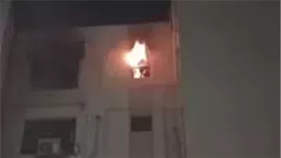 المعمل الجنائي يفحص حريق شقة بالقاهرة الجديدة (صور)