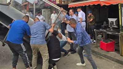 رفع 300 حالة إشغال وتعديات من المحال والمنشآت التجارية بالجيزة 