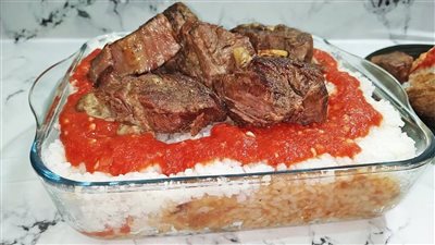 الفطار الرسمي في العيد، فوائد وأضرار الفتة المصرية وهؤلاء ممنوعون منها (فيديو)