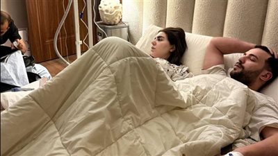 مسلم برفقة زوجته من فراش المرض: حسبي الله ونعم الوكيل