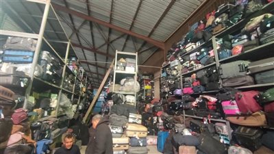 إخلاء 10 آلاف حقيبة وطرد من مخازن مطار القاهرة الدولي