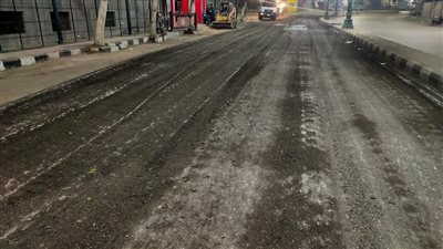  كشط شارع 23 يوليو واستكمال أعمال الرصف بشوارع غرب أسيوط