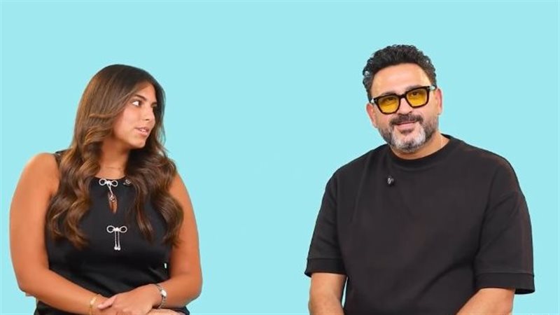أكرم حسني وابنته،