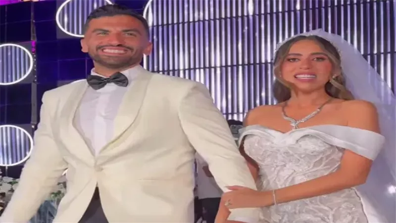 منة القيعي وزوجها،