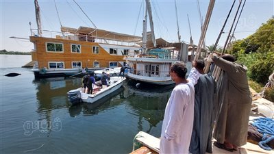 انزلق من على مركب، الإنقاذ النهري يبحث عن جثمان شاب سقط في نيل الأقصر (صور)