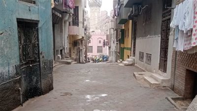  استكمال تركيب الانترلوك بحارات حي غرب أسيوط عقب رفع المخلفات والتعديات