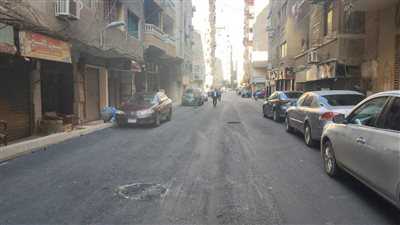 الجيزة تنتهي من رصف الطبقة السطحية لشارع السلام | فيديو