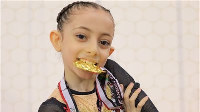 اللاعبة تمنى أحمد عواد تتوج بالميدالية الذهبية في بطولة كأس مصر للجمباز